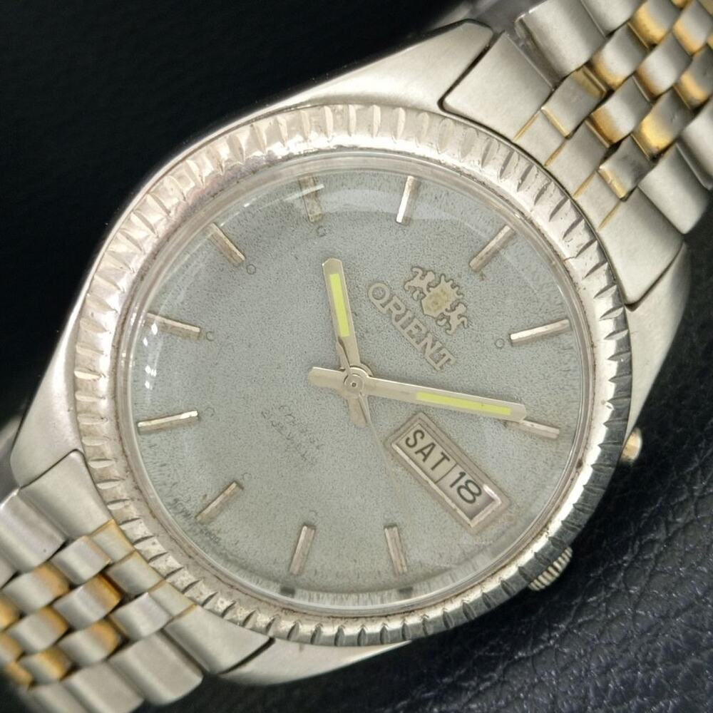 Vintage 1976 Orient Automatic Mens Silver Watch W/daydate & Silver accents